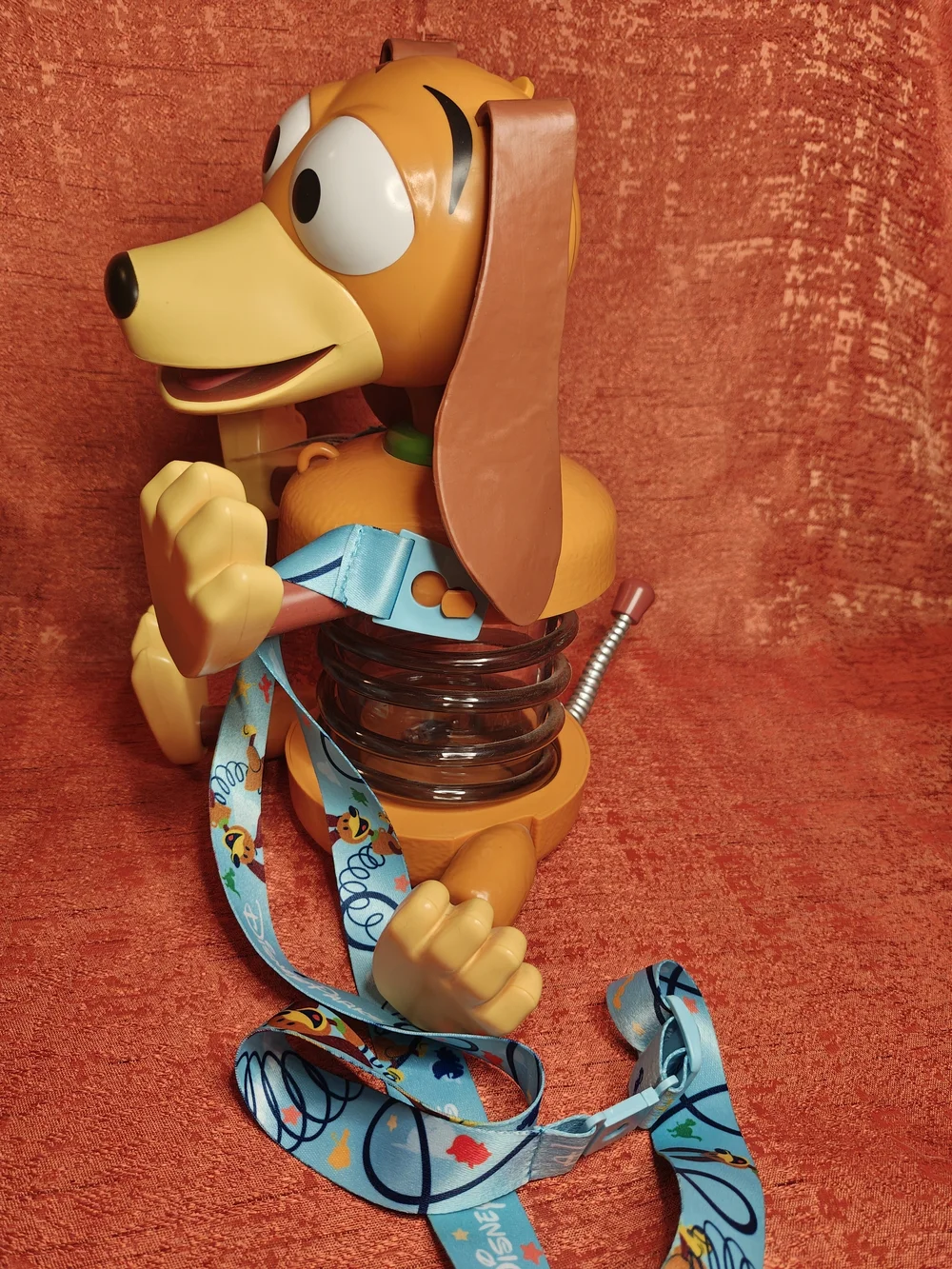 Disney Orange Slinky Dog Pop Corn Bucket, Sipper with Blue Character Lanyard